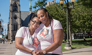 Wanda, cervical cancer patient at Henry Ford Health, with her sister in downtown Detroit