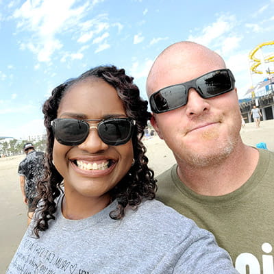 Digestive patient Kathy with her husband on the beach