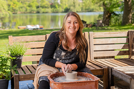 ENT patient Lisa Smith doing pottery