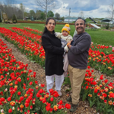 cardiology-patient-amber-and husband holding-their-son