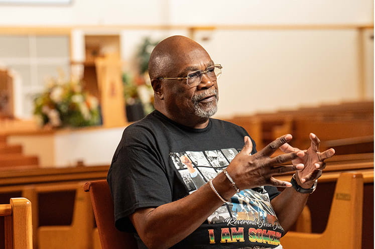 Rev. Anthony speaking in the church
