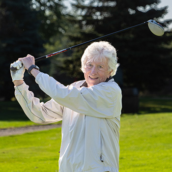 Heart surgery patient Cyril playing golf