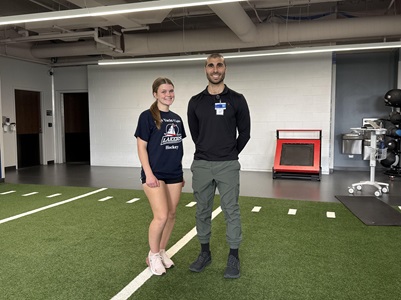 Molly Cornwell and Mark Karam in physical therapy gym