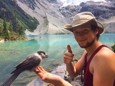 Ryan Marshall outdoors with bird