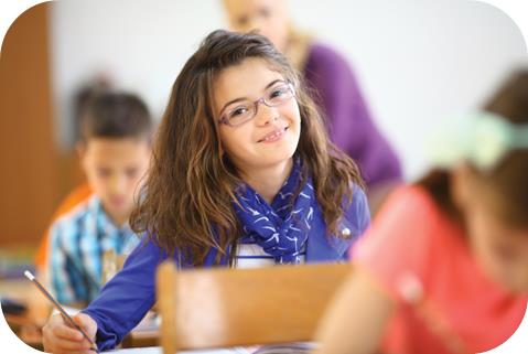 child in school with glasses