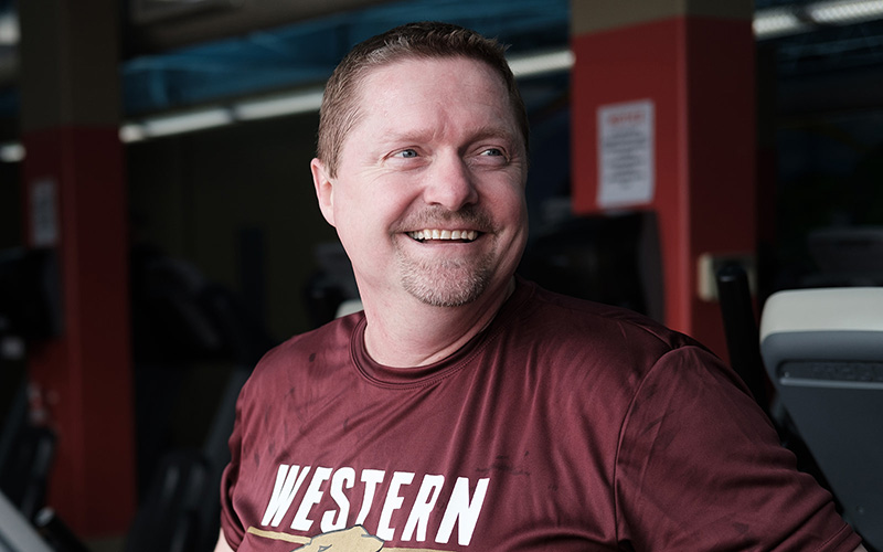 Double bypass heart surgery patient Mike Smajda smiling in gym Double bypass heart surgery patient Mike Smajda smiling in gym