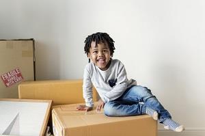 Boy on Moving Box