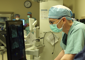 Dr. Craig Rogers using robotic HIFU system