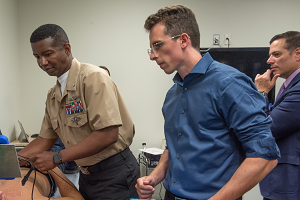 Navy Medic Training A United States Navy Medic learns to use ultrasounds during training in this Henry Ford Health photo.