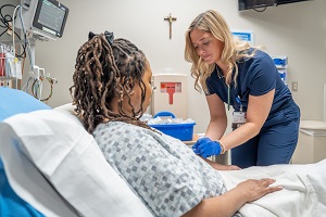 nurse at the bedside 