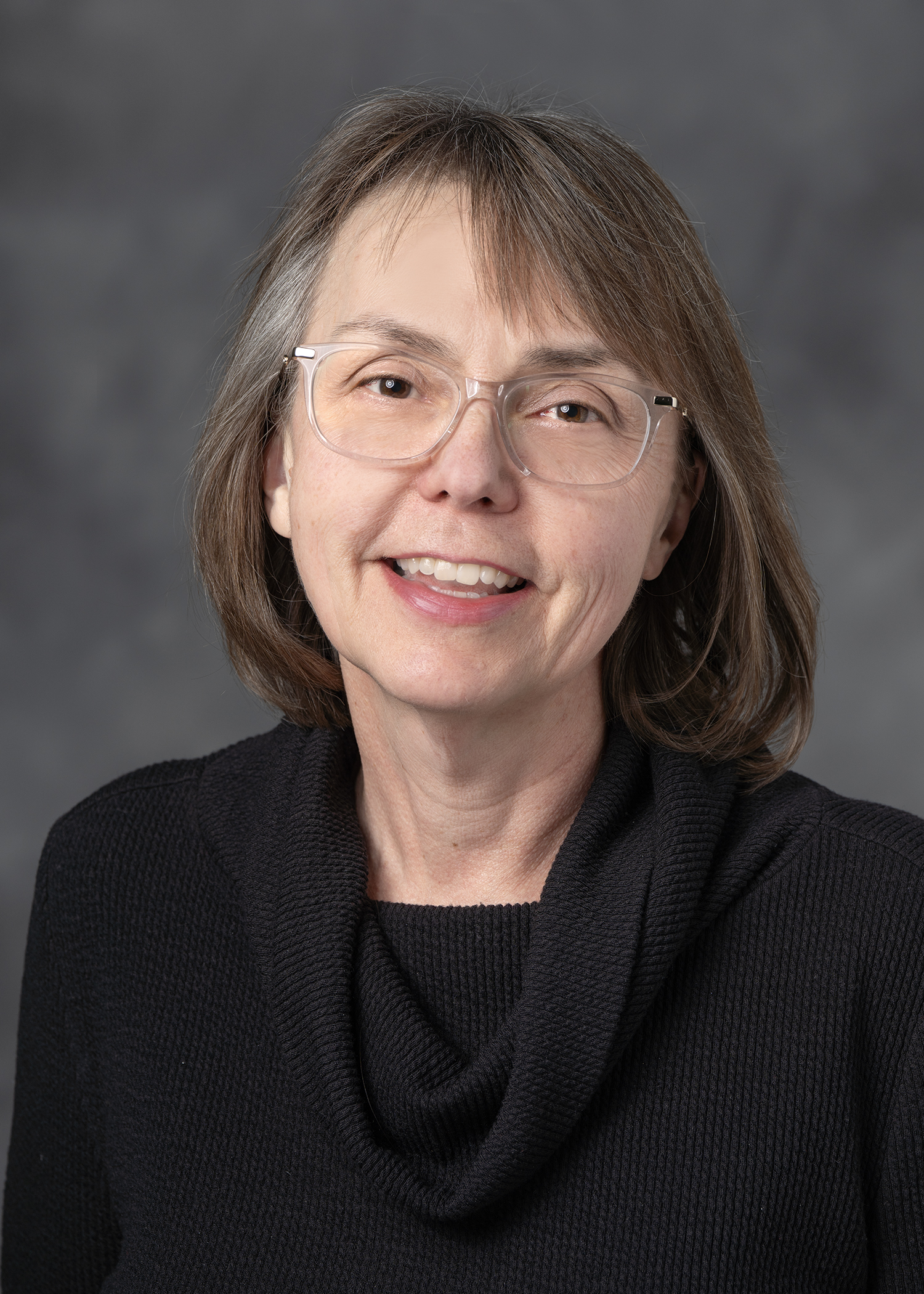 Dr. Christine Neslund-Dudas