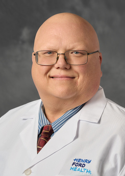 Mark E Holowinski