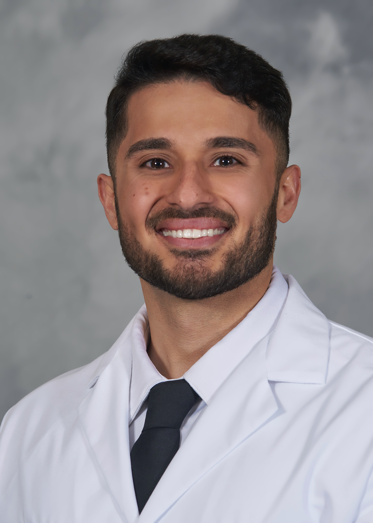 Dr. Mouzaihem