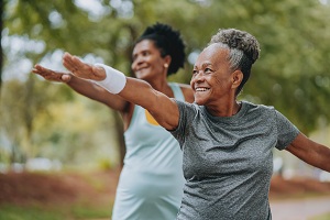 Two women exercising 